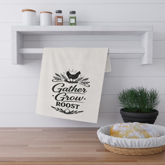 Decorative towel with text hanging on a wall in a kitchen setting