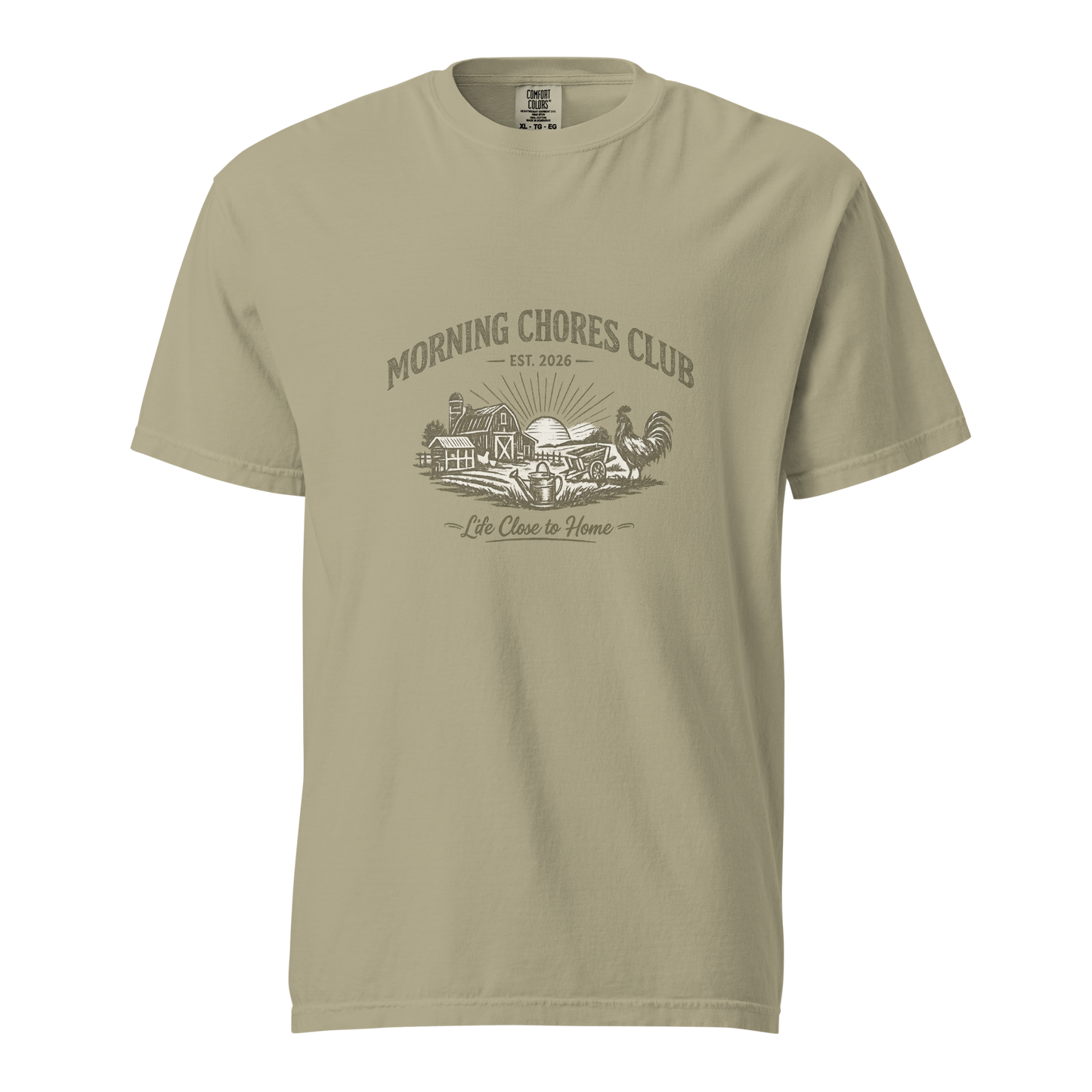 Celebrate the rhythm of homestead living with the Morning Chores Club™ Heritage Tee. A premium vintage-inspired shirt for gardeners, chicken keepers, and those who love life close to home.