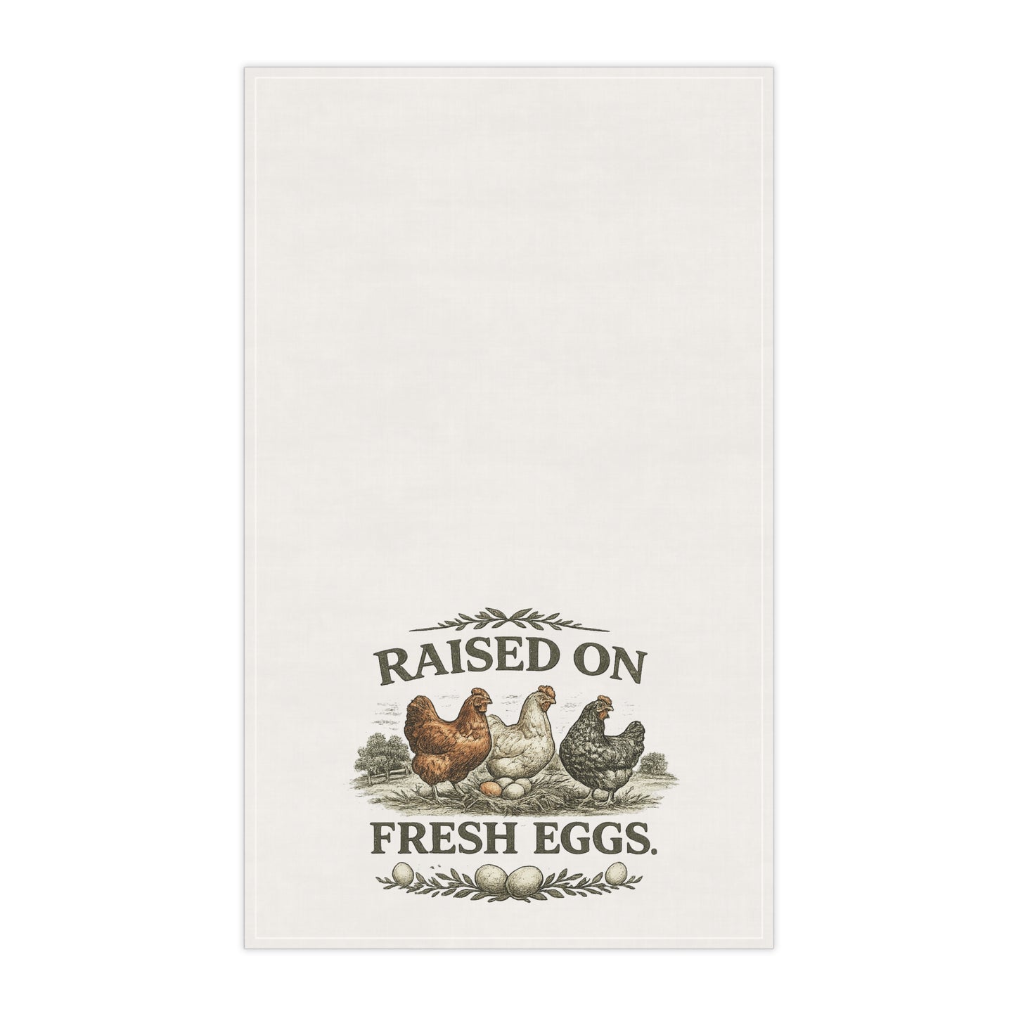 White towel with chicken illustration and 'Raised on Fresh Eggs' text on a white background