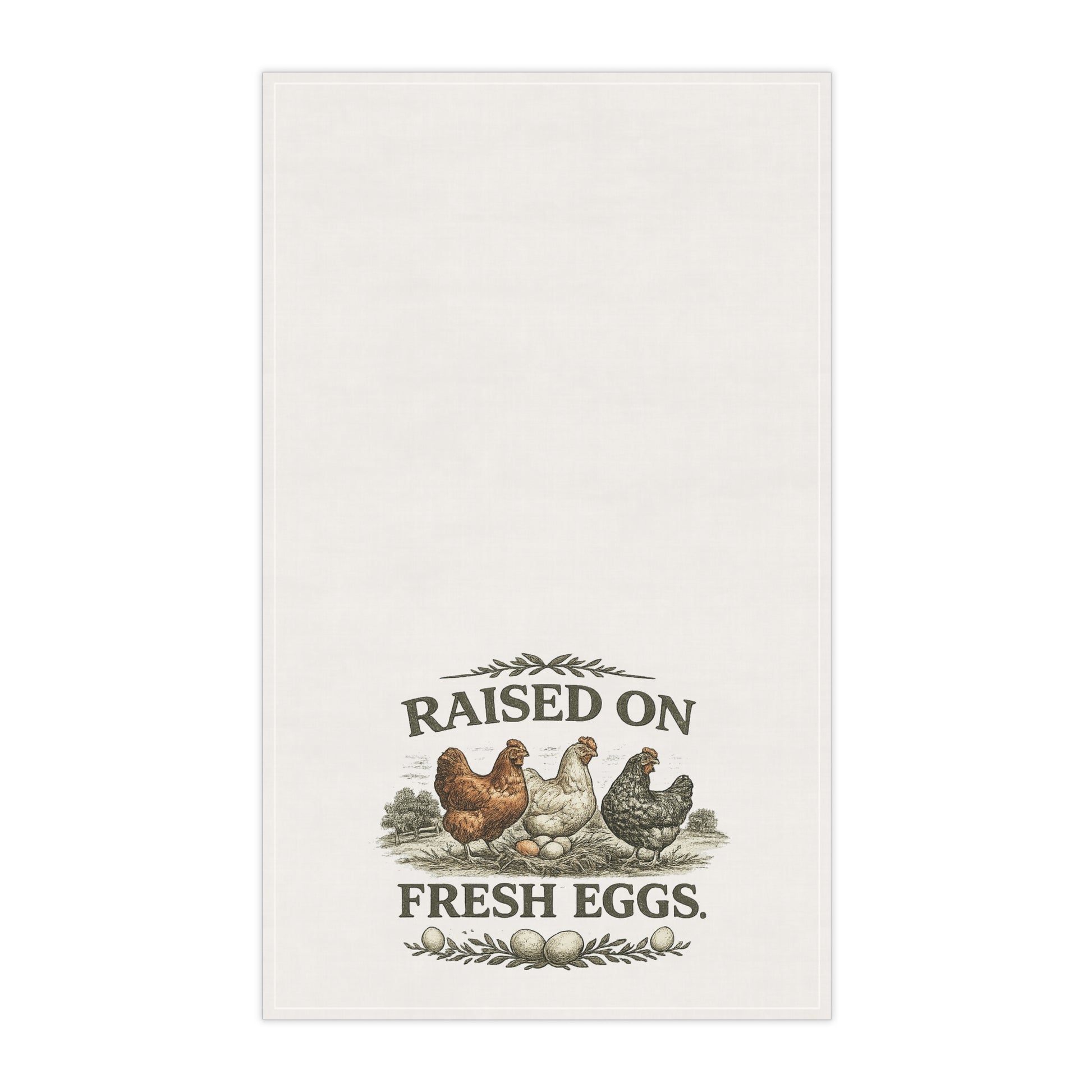 White towel with chicken illustration and 'Raised on Fresh Eggs' text on a white background